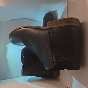 Cat & Jack Black Boots with Black sparkles in the back of the boot.